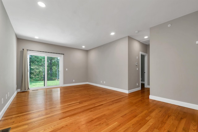 8C Villa Ln, Goffstown, NH 03045 - spare room featuring light wood-style flooring, recessed lighting, and a smoke detector