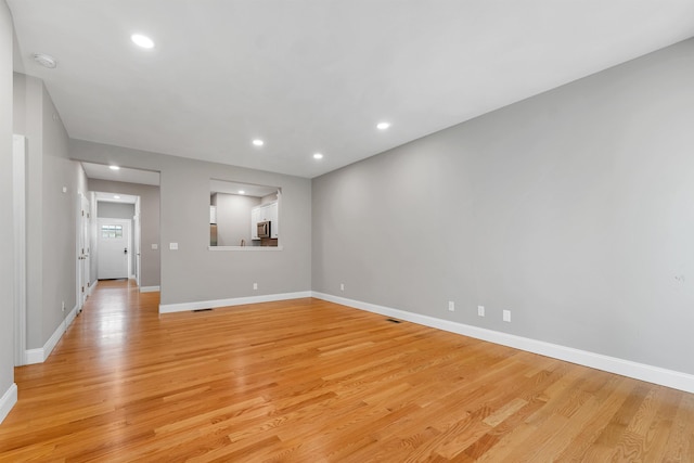 8C Villa Ln, Goffstown, NH 03045 - unfurnished room featuring light wood finished floors, recessed lighting, and a smoke detector