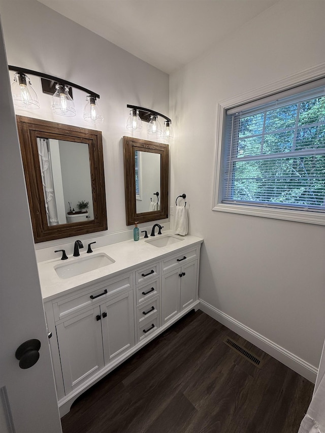 3800 Province Lake Rd, Wakefield, NH 03830 - bathroom with double vanity and wood finished floors