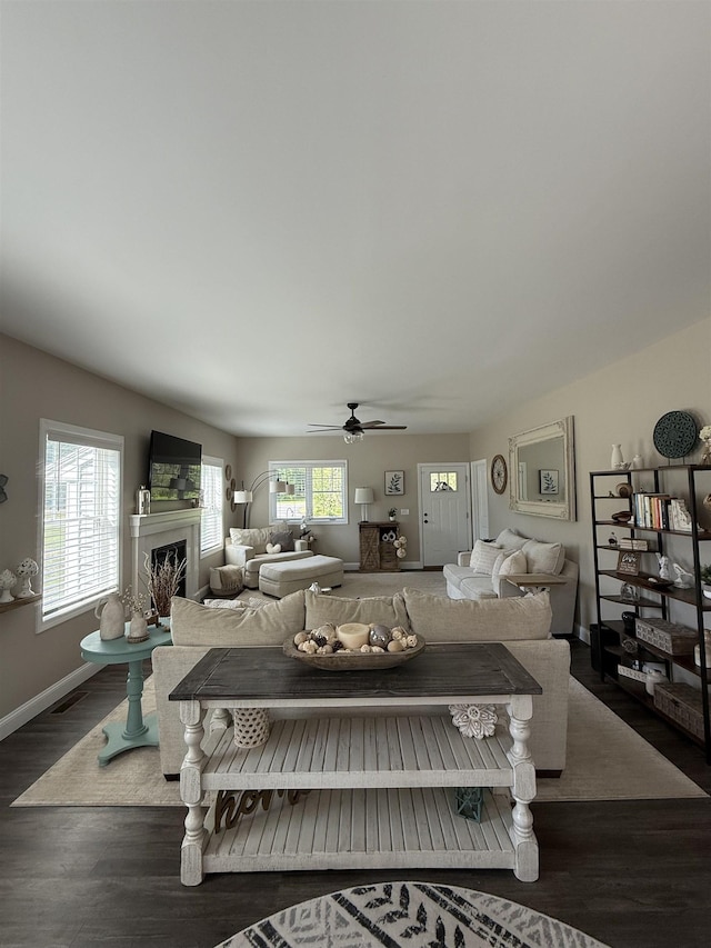 3800 Province Lake Rd, Wakefield, NH 03830 - living area with wood finished floors, a ceiling fan, and a fireplace