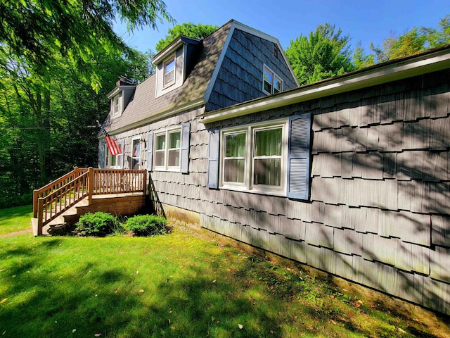 6 Cypress Ln, Essex, VT 05452 - view of side of property with a lawn, a deck, and stairs