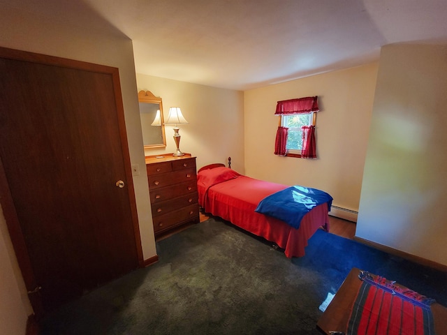 6 Cypress Ln, Essex, VT 05452 - bedroom with a baseboard radiator and dark carpet