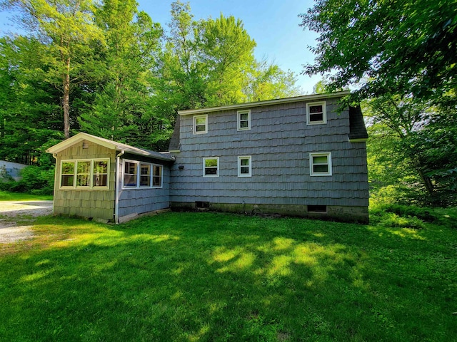 6 Cypress Ln, Essex, VT 05452 - rear view of property featuring a lawn