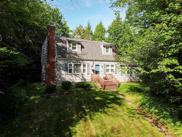6 Cypress Ln, Essex, VT 05452 - rear view of property with a lawn, a chimney, and roof with shingles