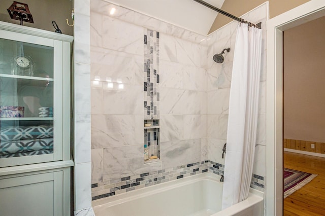 30 Thoreau Trl, Wakefield, NH 03830 - bathroom featuring shower / bath combination with curtain and wood finished floors