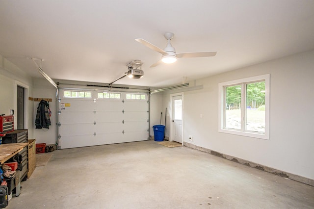 30 Thoreau Trl, Wakefield, NH 03830 - garage featuring a garage door opener and baseboards