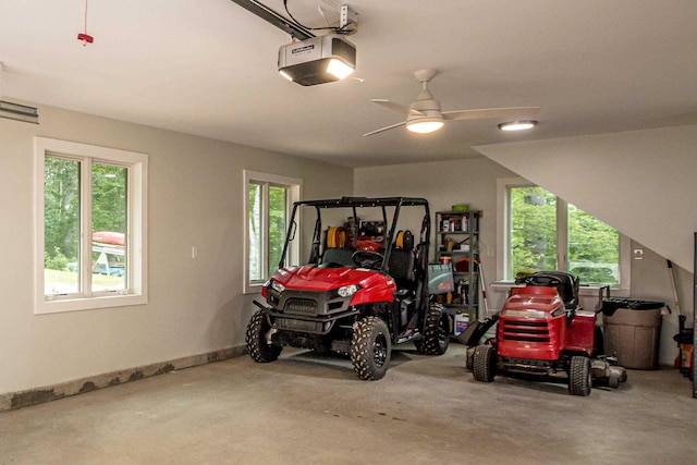 30 Thoreau Trl, Wakefield, NH 03830 - garage with a garage door opener and ceiling fan