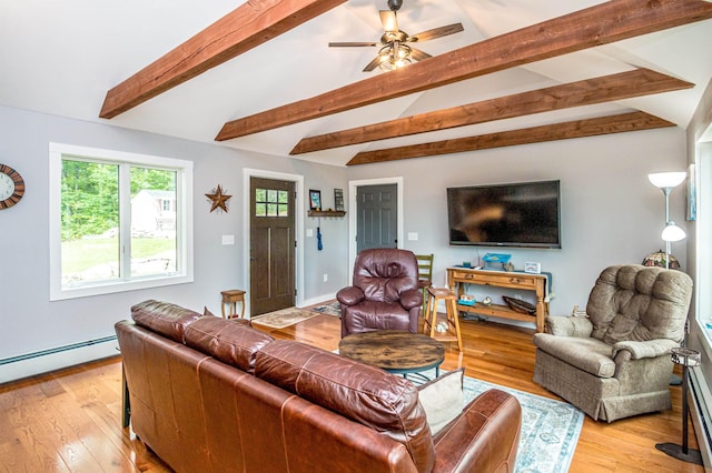30 Thoreau Trl, Wakefield, NH 03830 - living area with light wood-style floors, ceiling fan, and a baseboard heating unit