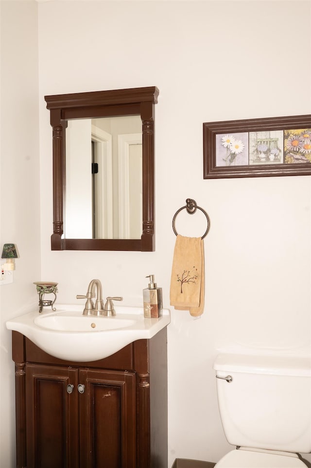 236 Cadieux Rd, Georgia, VT 05478 - half bathroom with vanity and toilet