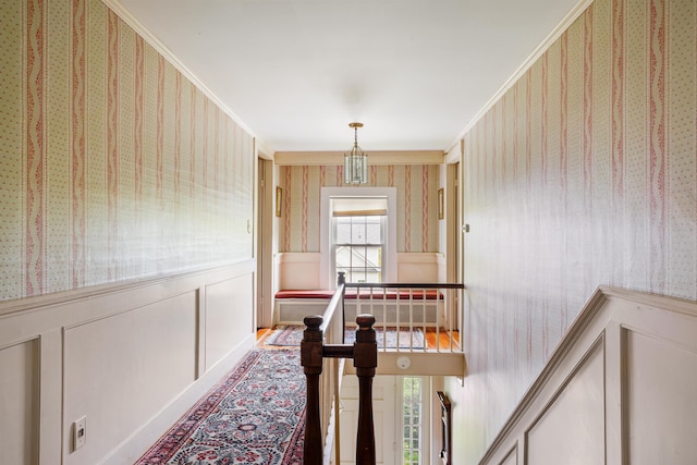 102 Hubbard Hill Rd, Rindge, NH 03461 - corridor featuring wallpapered walls, crown molding, and wainscoting