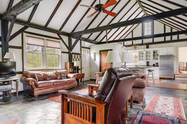 102 Hubbard Hill Rd, Rindge, NH 03461 - living room with high vaulted ceiling, stone tile floors, and ceiling fan