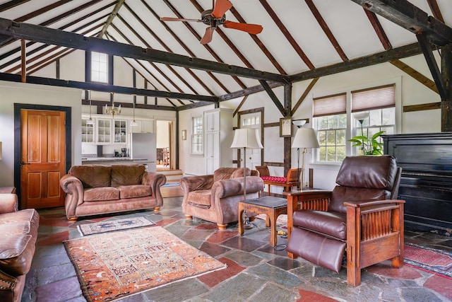 102 Hubbard Hill Rd, Rindge, NH 03461 - living area with high vaulted ceiling, a ceiling fan, stone tile flooring, and beam ceiling