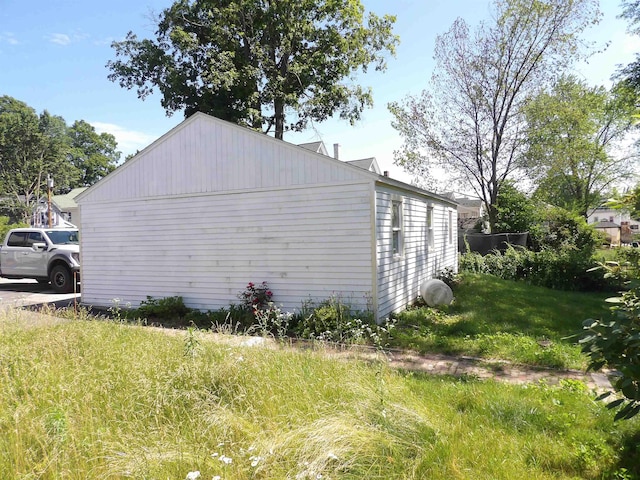 25 Downing St, Concord, NH 03301 - view of home's exterior featuring a yard