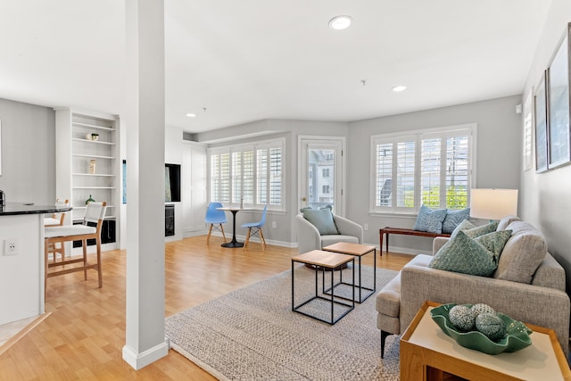 520 Ocean Blvd Unit 10, Hampton, NH 03842 - living area featuring light wood-style floors, healthy amount of natural light, and recessed lighting