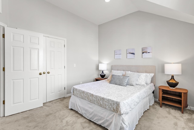 520 Ocean Blvd Unit 10, Hampton, NH 03842 - bedroom with light colored carpet, a closet, and vaulted ceiling