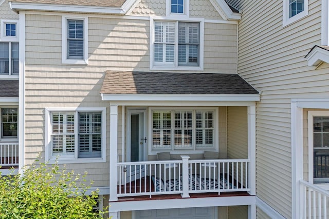 520 Ocean Blvd Unit 10, Hampton, NH 03842 - property entrance featuring a shingled roof