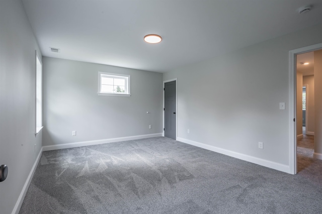 72-1 N Mast St, Goffstown, NH 03045 - spare room with carpet floors and baseboards