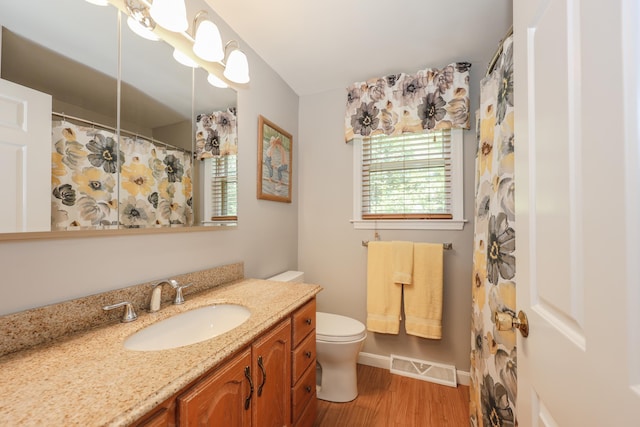 16 Custer Cir, Nashua, NH 03062 - full bathroom with vanity and wood finished floors