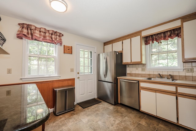 16 Custer Cir, Nashua, NH 03062 - kitchen featuring stainless steel appliances, light countertops, tasteful backsplash, and stone finish flooring