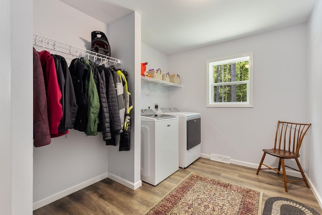 23 Pork Hill Rd, Ossipee, NH 03864 - laundry area with washer and dryer and wood finished floors