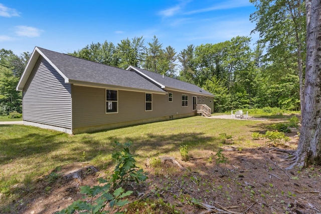 23 Pork Hill Rd, Ossipee, NH 03864 - view of home's exterior with a yard and roof with shingles