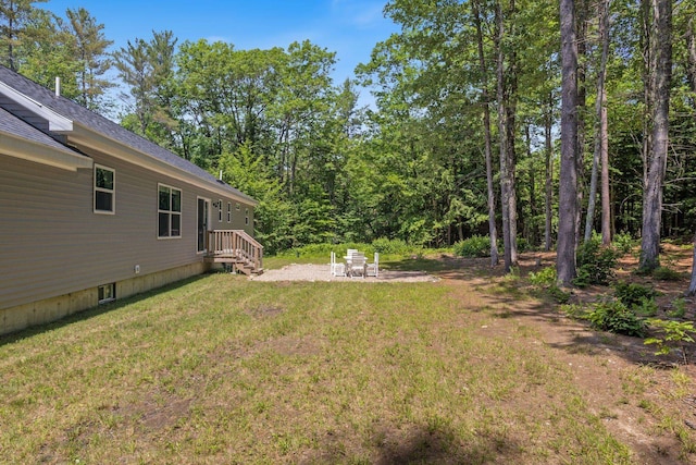 23 Pork Hill Rd, Ossipee, NH 03864 - view of green lawn with a patio area