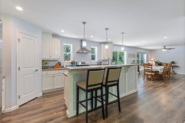 23 Pork Hill Rd, Ossipee, NH 03864 - kitchen featuring wall chimney range hood, dark wood-style flooring, white cabinetry, and recessed lighting