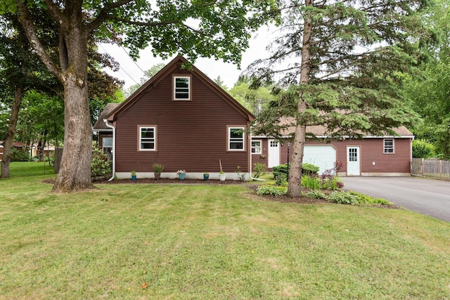 21 Redington Rd, Concord, NH 03301 - view of front facade with asphalt driveway and a garage