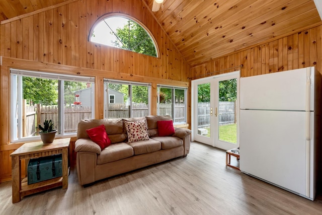 21 Redington Rd, Concord, NH 03301 - living room featuring wood walls, healthy amount of natural light, wooden ceiling, high vaulted ceiling, and french doors