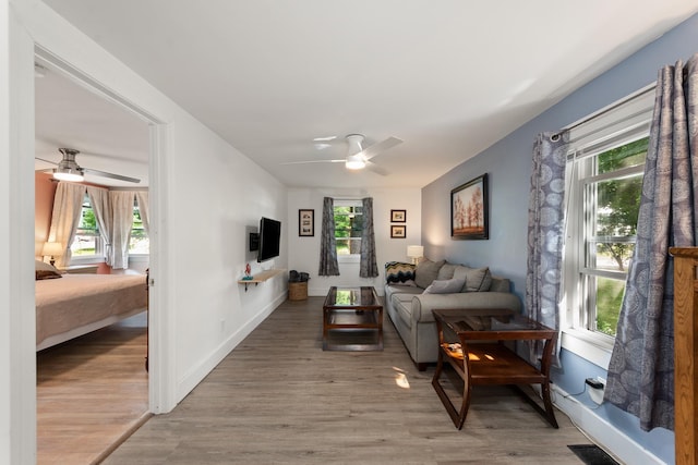 21 Redington Rd, Concord, NH 03301 - living area with a ceiling fan and healthy amount of natural light