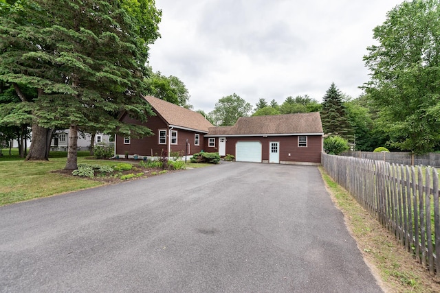 21 Redington Rd, Concord, NH 03301 - ranch-style home with a garage and asphalt driveway