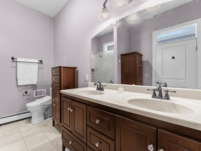 1 Dragonfly Way, Londonderry, NH 03053 - bathroom featuring double vanity and baseboard heating