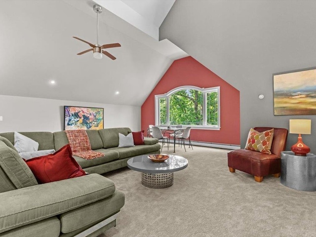 1 Dragonfly Way, Londonderry, NH 03053 - living room with vaulted ceiling, carpet, ceiling fan, and a baseboard radiator