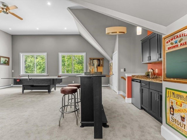 1 Dragonfly Way, Londonderry, NH 03053 - kitchen featuring light carpet, ceiling fan, lofted ceiling, a breakfast bar area, and stainless steel dishwasher