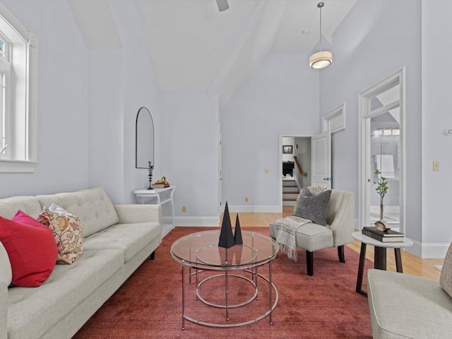 1 Dragonfly Way, Londonderry, NH 03053 - living room with high vaulted ceiling and stairs