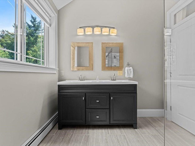 1 Dragonfly Way, Londonderry, NH 03053 - full bath featuring baseboard heating and double vanity