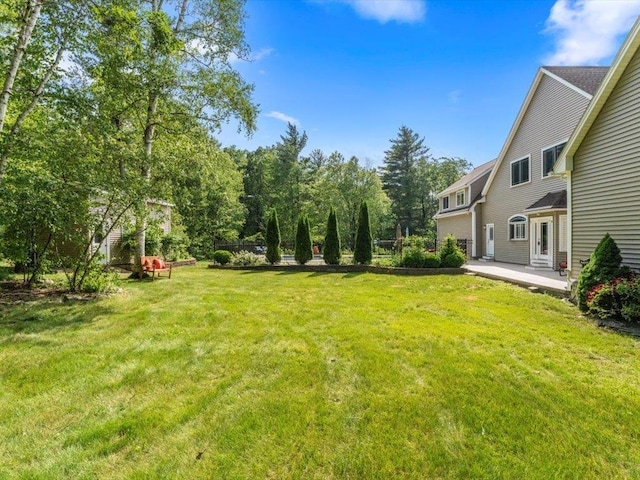 1 Dragonfly Way, Londonderry, NH 03053 - view of green lawn with a patio