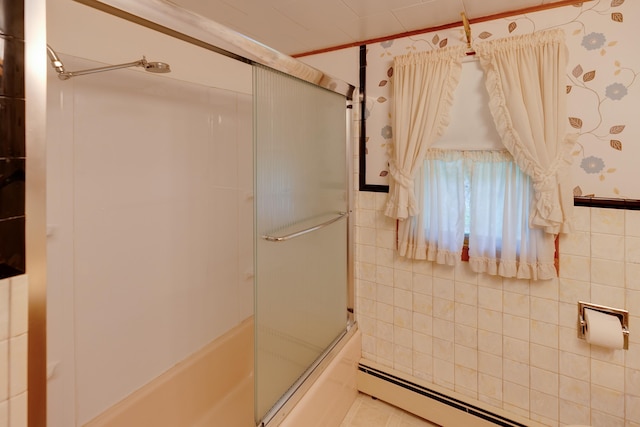 141 Manns Hill Rd, Littleton, NH 03561 - full bathroom with a baseboard heating unit, combined bath / shower with glass door, and tile walls