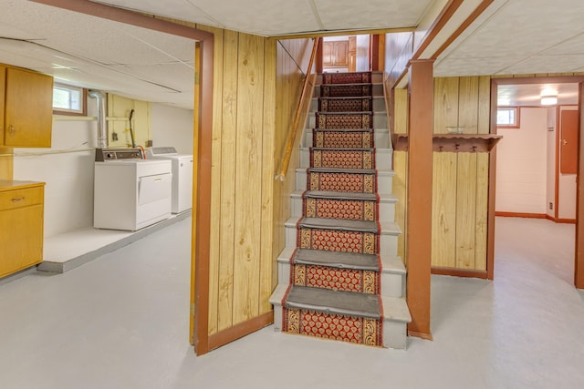 141 Manns Hill Rd, Littleton, NH 03561 - stairway featuring wooden walls, washer and clothes dryer, and a drop ceiling
