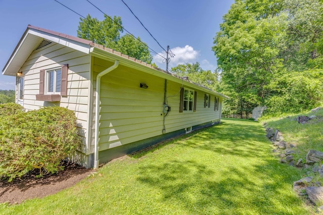 141 Manns Hill Rd, Littleton, NH 03561 - view of side of home featuring a lawn