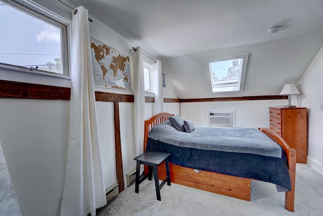 15 Arbor St # 1, Exeter, NH 03833 - carpeted bedroom with a skylight, vaulted ceiling, and a wall unit AC