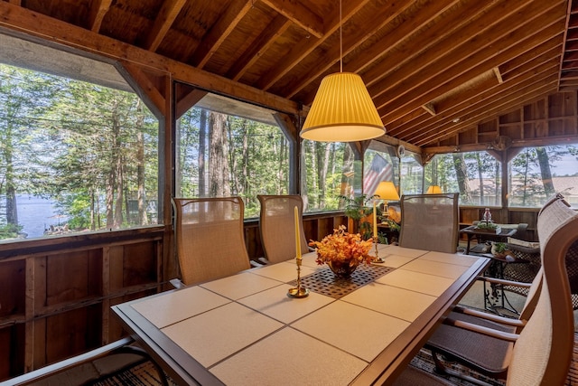 396 Mica Point Rd, Barrington, NH 03825 - sunroom with outdoor dining space and vaulted ceiling