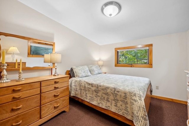 396 Mica Point Rd, Barrington, NH 03825 - bedroom with dark carpet and lofted ceiling