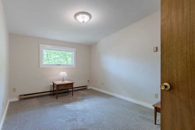 396 Mica Point Rd, Barrington, NH 03825 - spare room featuring a baseboard radiator and carpet