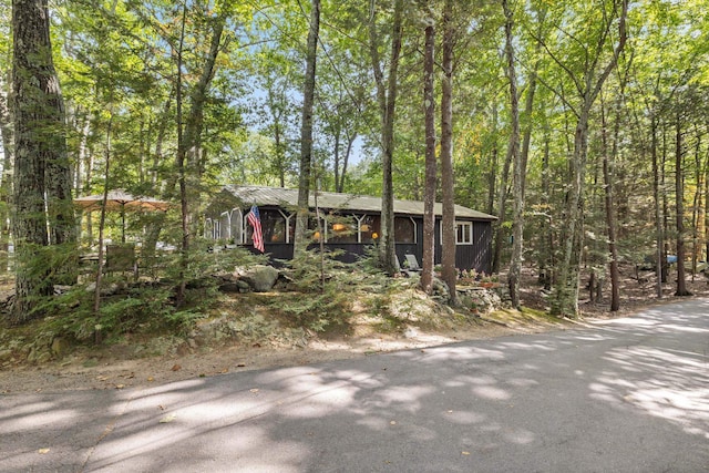 396 Mica Point Rd, Barrington, NH 03825 - view of front of house featuring a view of trees