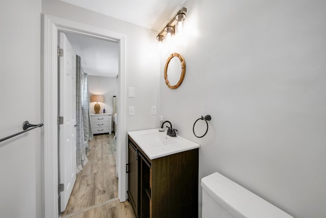 20 Cimmarron Dr, Nashua, NH 03062 - bathroom with vanity and wood finished floors