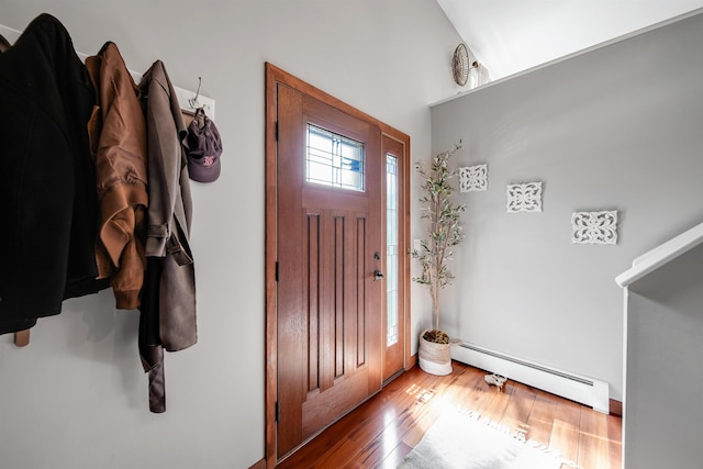 20 Cimmarron Dr, Nashua, NH 03062 - foyer with a baseboard heating unit, wood finished floors, and a towering ceiling