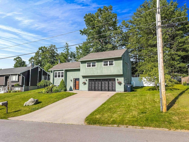 20 Cimmarron Dr, Nashua, NH 03062 - split level home with concrete driveway, a garage, and roof with shingles
