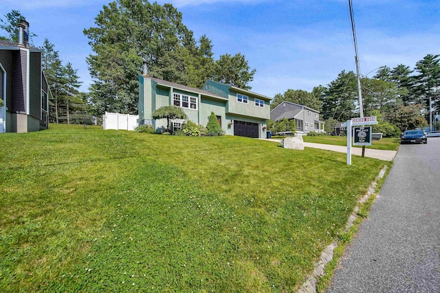 20 Cimmarron Dr, Nashua, NH 03062 - split level home featuring a garage and driveway