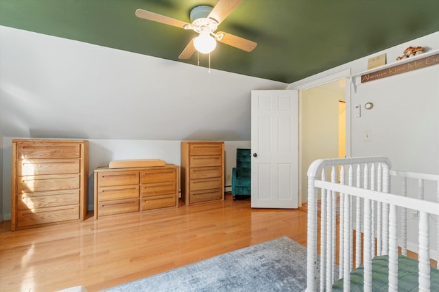 38 Heald St, Goffstown, NH 03102 - bedroom featuring lofted ceiling, light wood finished floors, ceiling fan, and a nursery area